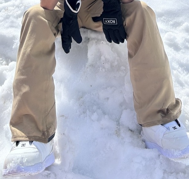 My daughter's tan Volcom Species snow pants on the mountain