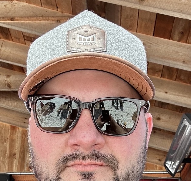 Kyle wearing his gray Melin thermal wool cap at the resort